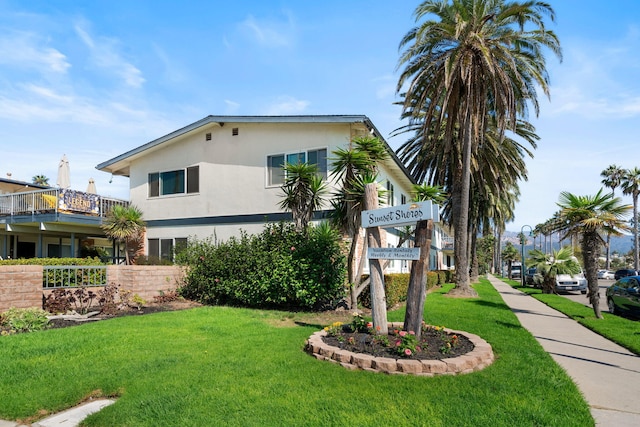 4980 Sandyland Rd Unit 104, Carpinteria, CA 93013 - view of side of property with stucco siding and a yard
