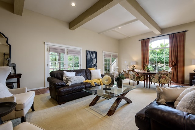 tiled living room featuring beam ceiling