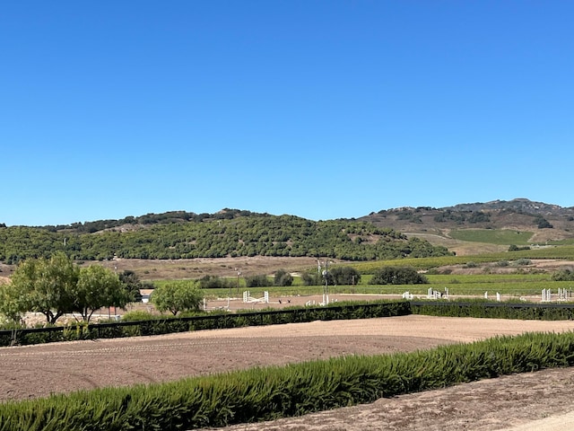 view of mountain feature featuring a rural view