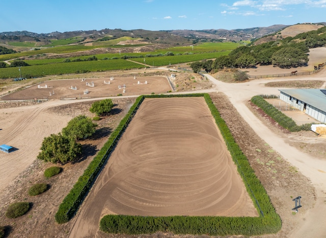 drone / aerial view with a rural view and a mountain view