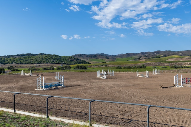 view of mountain feature with a rural view