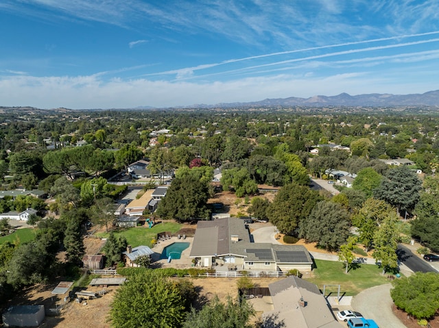 drone / aerial view featuring a mountain view