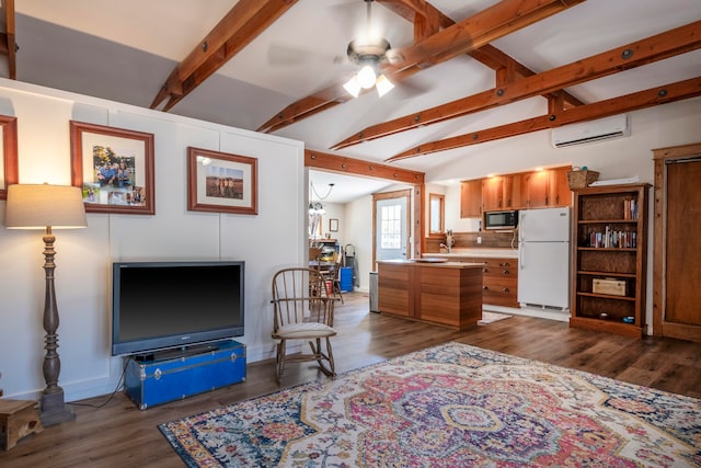 living room with a wall mounted AC, lofted ceiling with beams, ceiling fan, and dark hardwood / wood-style flooring