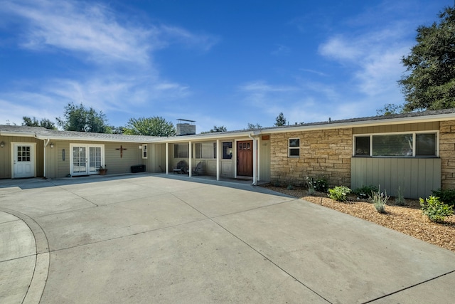 ranch-style house with a patio area