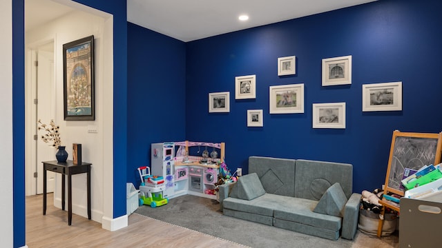 game room featuring light hardwood / wood-style flooring