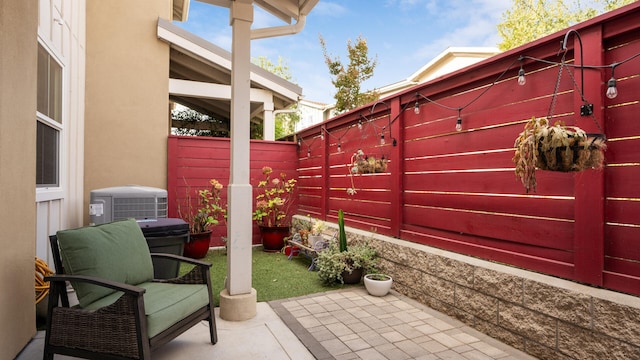 view of patio with central AC unit