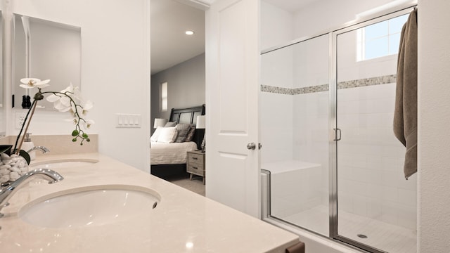 bathroom with vanity and an enclosed shower