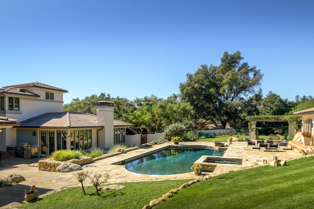 view of pool featuring a patio and a lawn