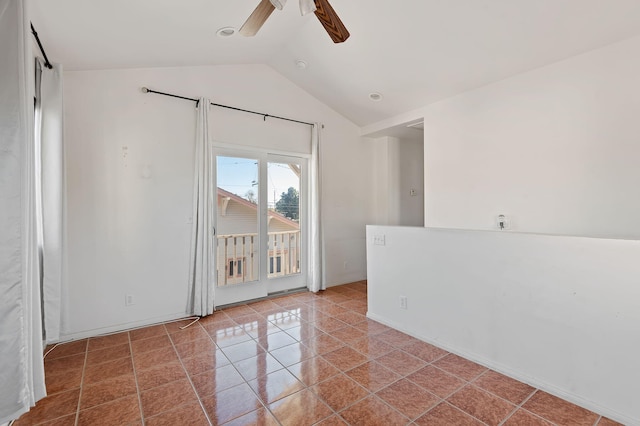 empty room with ceiling fan and lofted ceiling