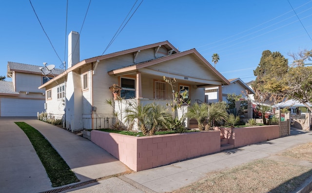 bungalow-style home featuring a garage