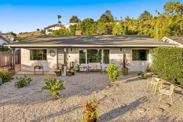 rear view of property with a patio