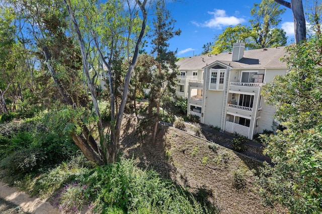 exterior space featuring a balcony