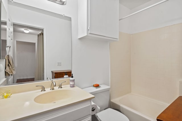 full bathroom featuring vanity, toilet, and tub / shower combination