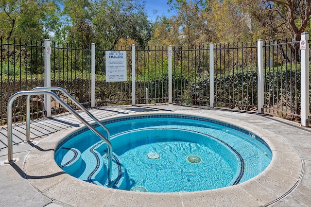 view of pool featuring a community hot tub