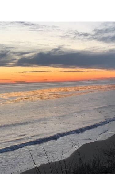 property view of water featuring a beach view