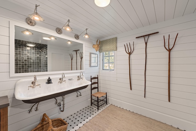 bathroom with wooden walls