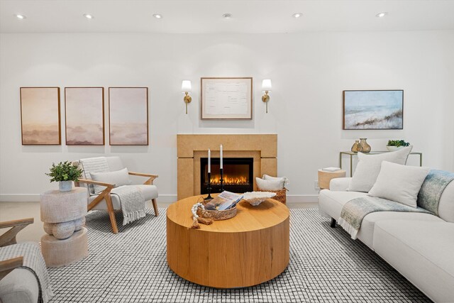 71 Seaview Dr, Santa Barbara, CA 93108 - living room with a warm lit fireplace, recessed lighting, baseboards, and carpet