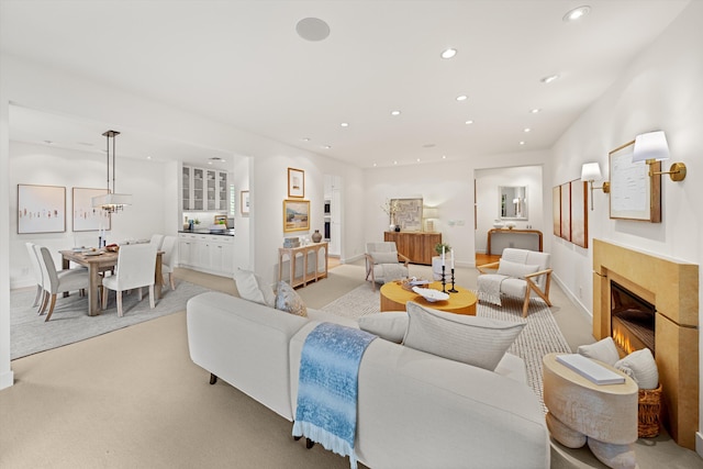 71 Seaview Dr, Santa Barbara, CA 93108 - living area with light colored carpet, recessed lighting, a glass covered fireplace, and baseboards