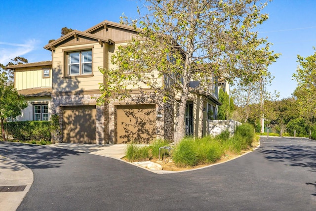 craftsman inspired home featuring a garage