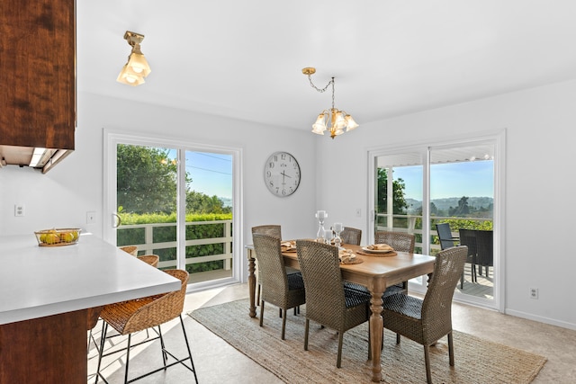 dining room with a chandelier