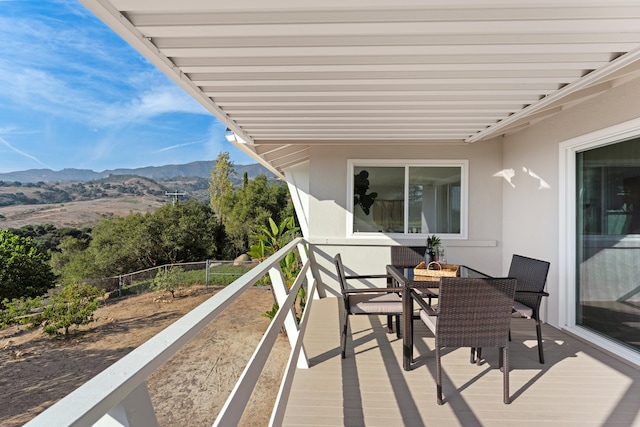 balcony featuring a mountain view