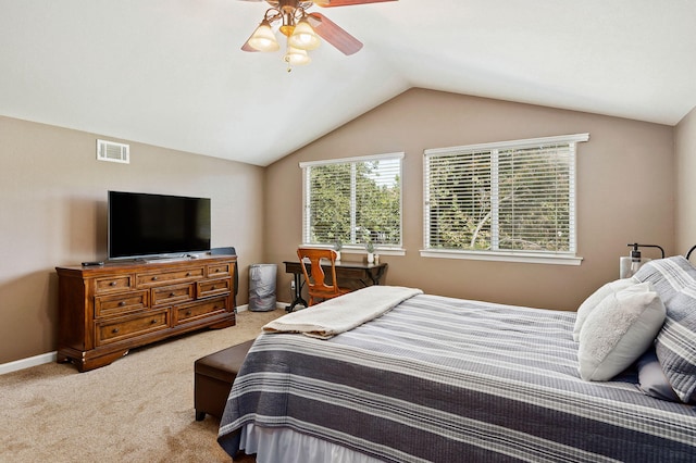 carpeted bedroom with ceiling fan and lofted ceiling