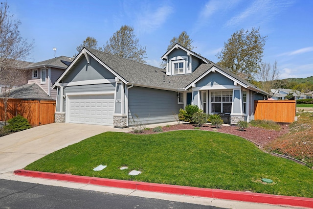 320 Savanna Dr, Los Alamos, CA 93440 - view of front of home featuring a garage, stone siding, a shingled roof, and driveway