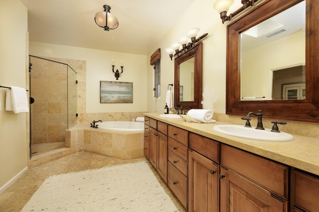 bathroom with shower with separate bathtub and vanity