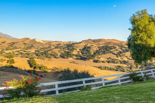 view of mountain feature featuring a rural view