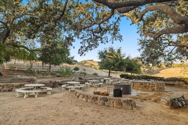 view of yard with a rural view