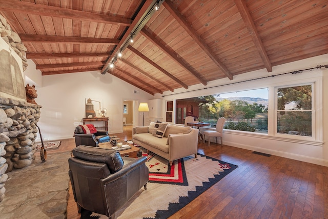 living room with hardwood / wood-style flooring, vaulted ceiling with beams, wood ceiling, and track lighting