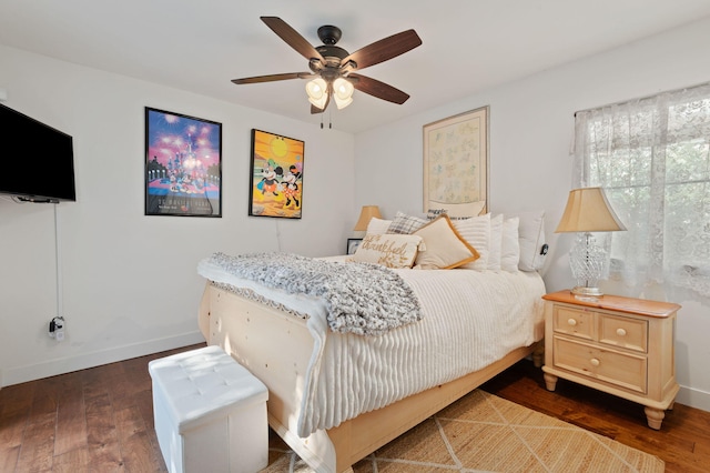 bedroom featuring ceiling fan and dark wood-type flooring