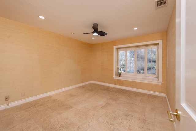 unfurnished room featuring ceiling fan