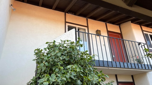 view of property exterior with a balcony