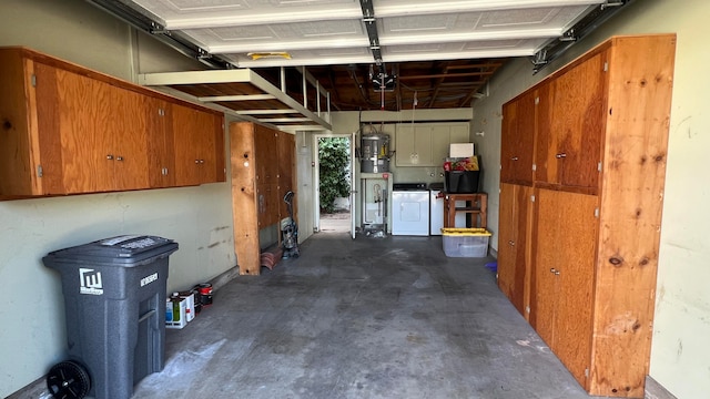 garage with washing machine and dryer