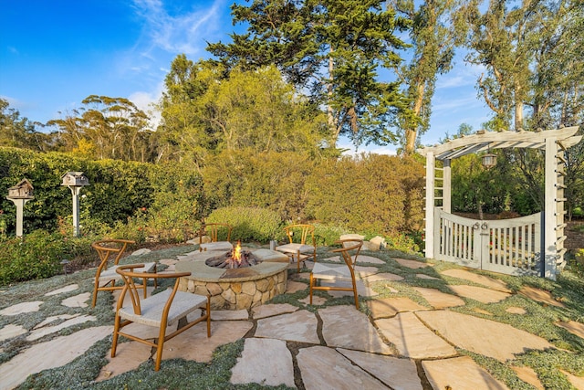 view of patio / terrace with a fire pit