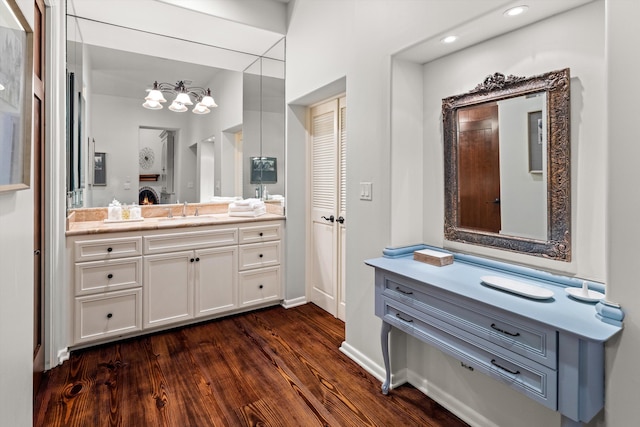 bathroom featuring hardwood / wood-style floors and vanity