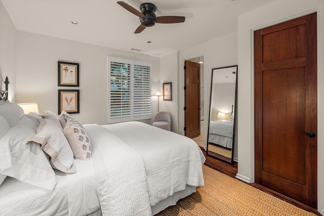 bedroom featuring light wood-type flooring and ceiling fan