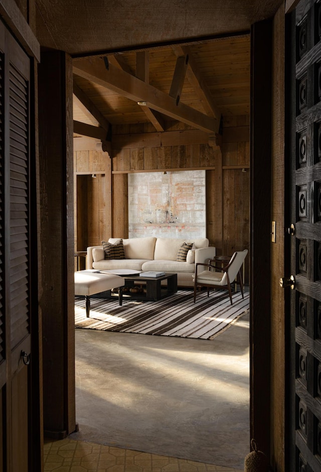 interior space featuring vaulted ceiling with beams and wood ceiling