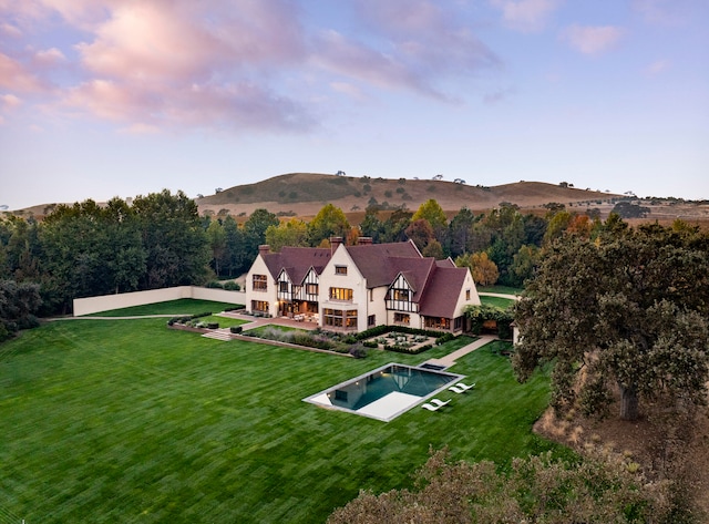 view of subject property with a mountainous background