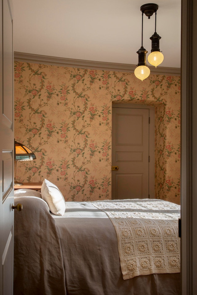 bedroom featuring crown molding