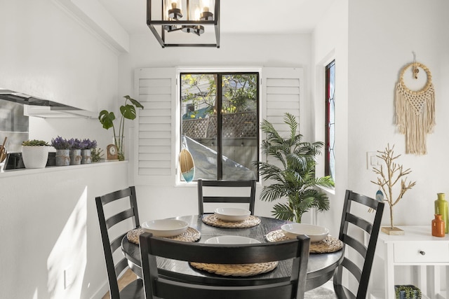 dining room featuring a notable chandelier