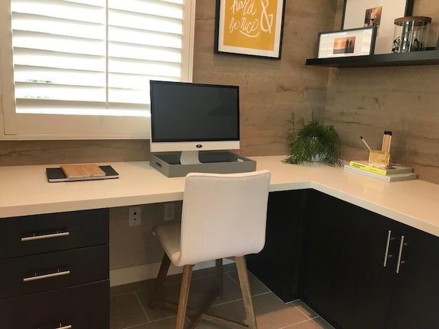 tiled office featuring built in desk