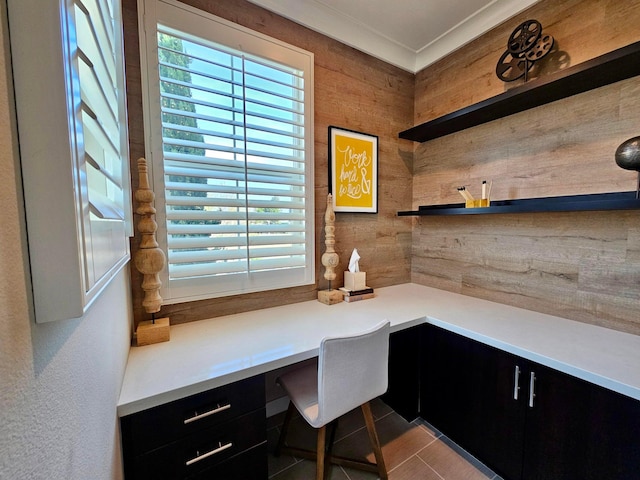 office area with built in desk and light tile patterned flooring