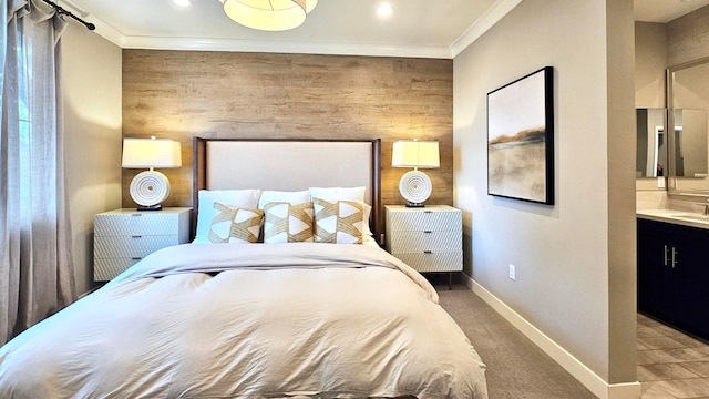 bedroom featuring carpet floors, wooden walls, and ornamental molding