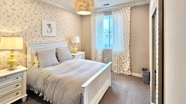 carpeted bedroom with crown molding