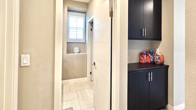 bathroom featuring tile patterned flooring