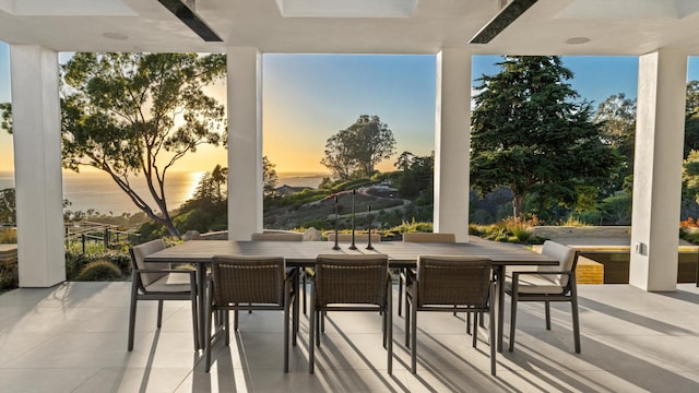 view of patio terrace at dusk