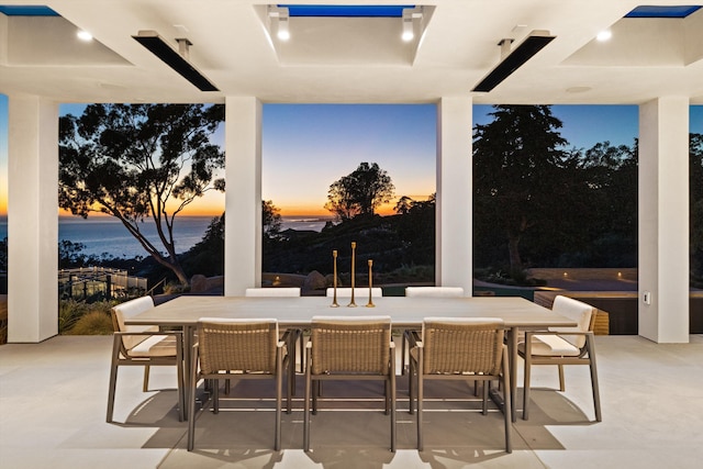 view of patio terrace at dusk