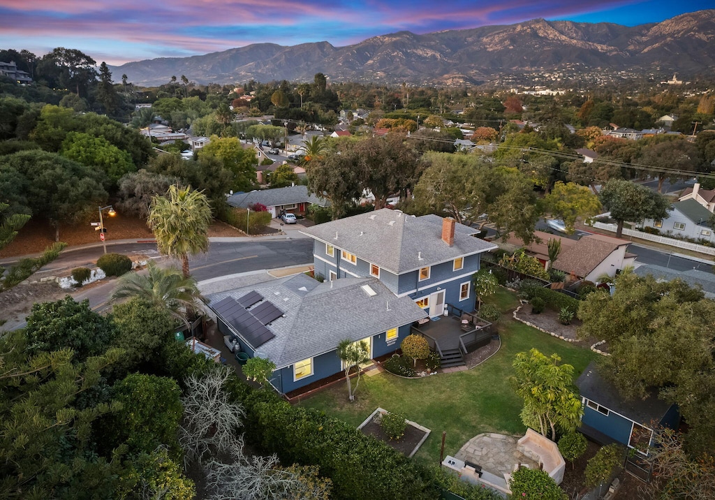 aerial view at dusk with a mountain view